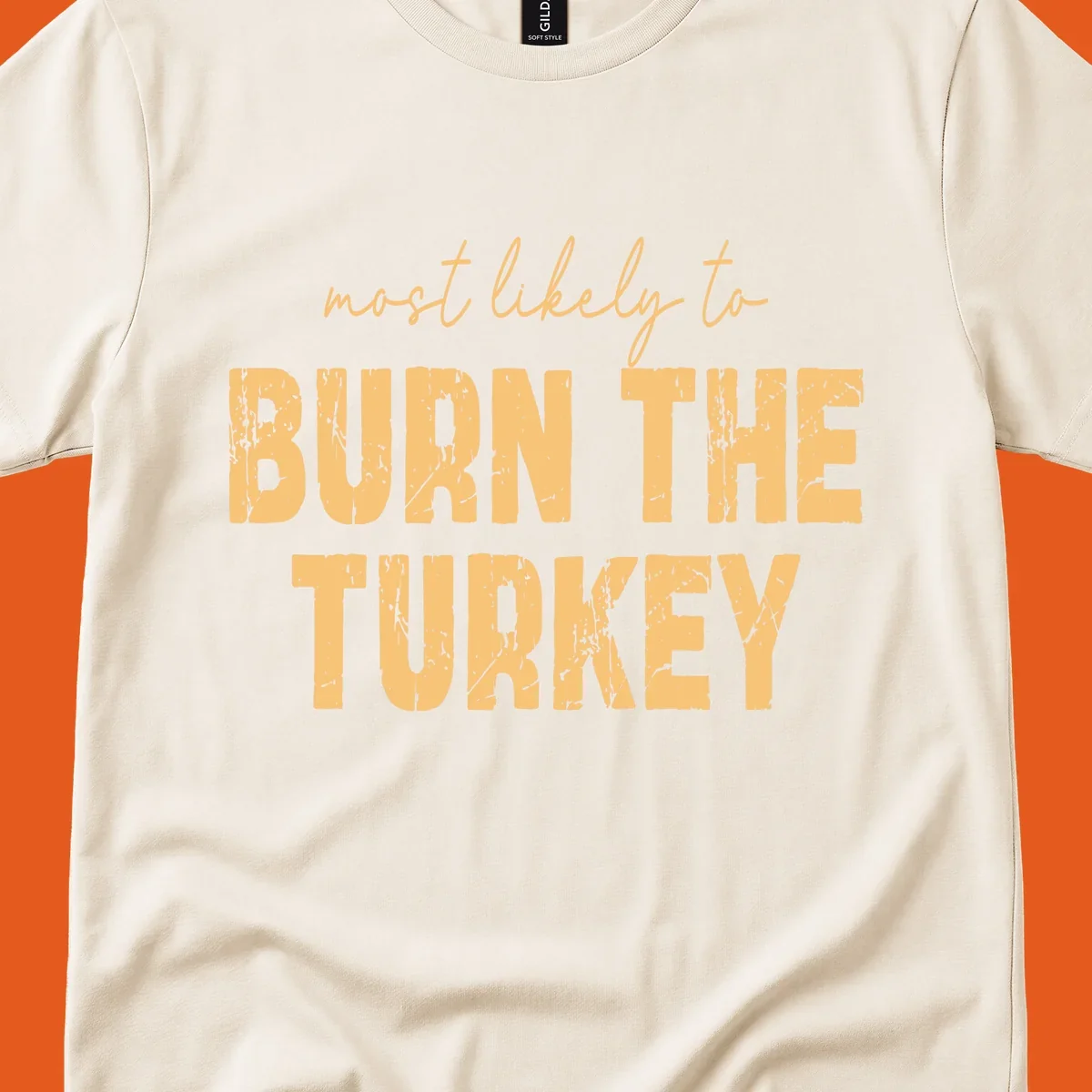 Text design "most likely to BURN THE TURKEY" with distressed lettering.