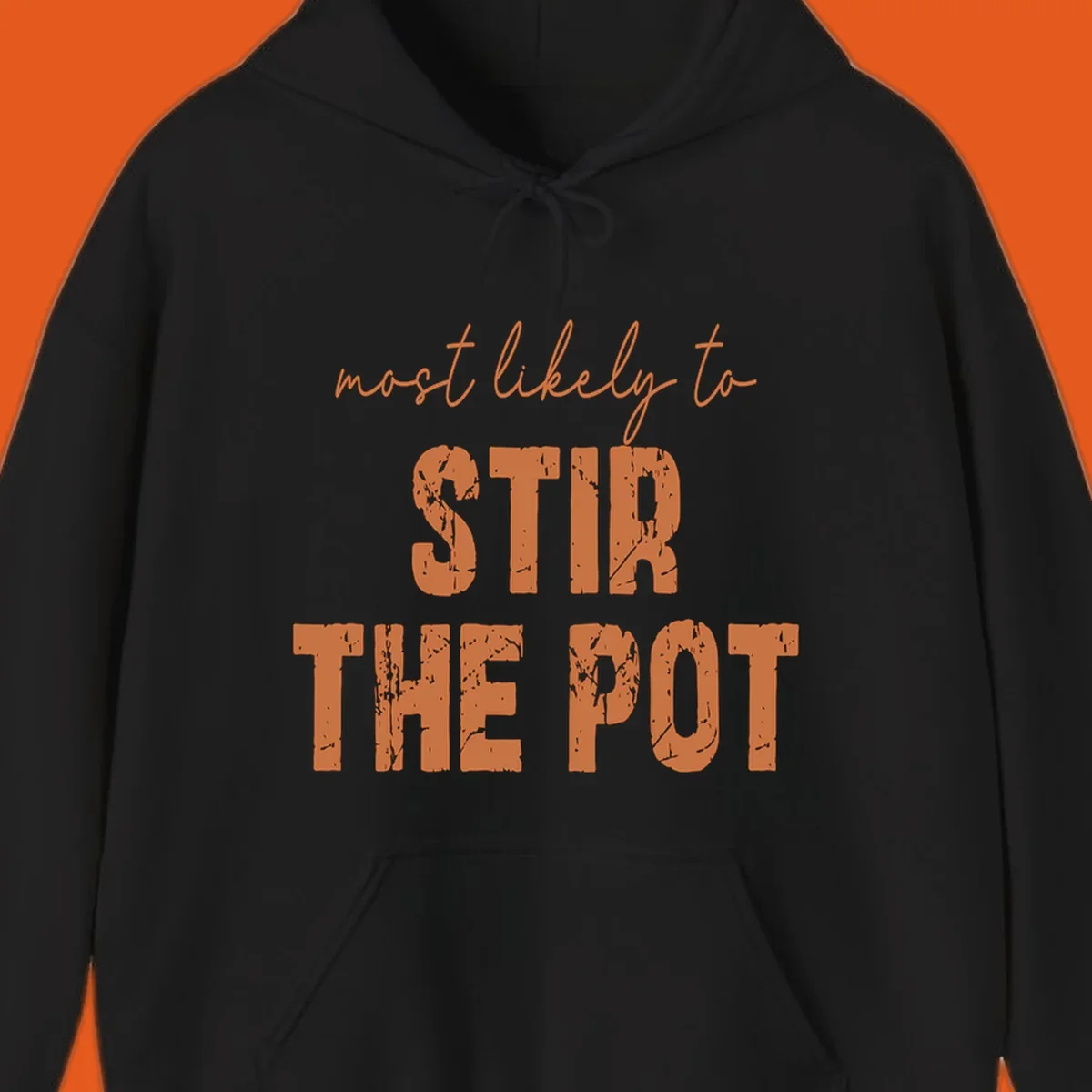 Text design: "most likely to STIR THE POT" in distressed orange letters.