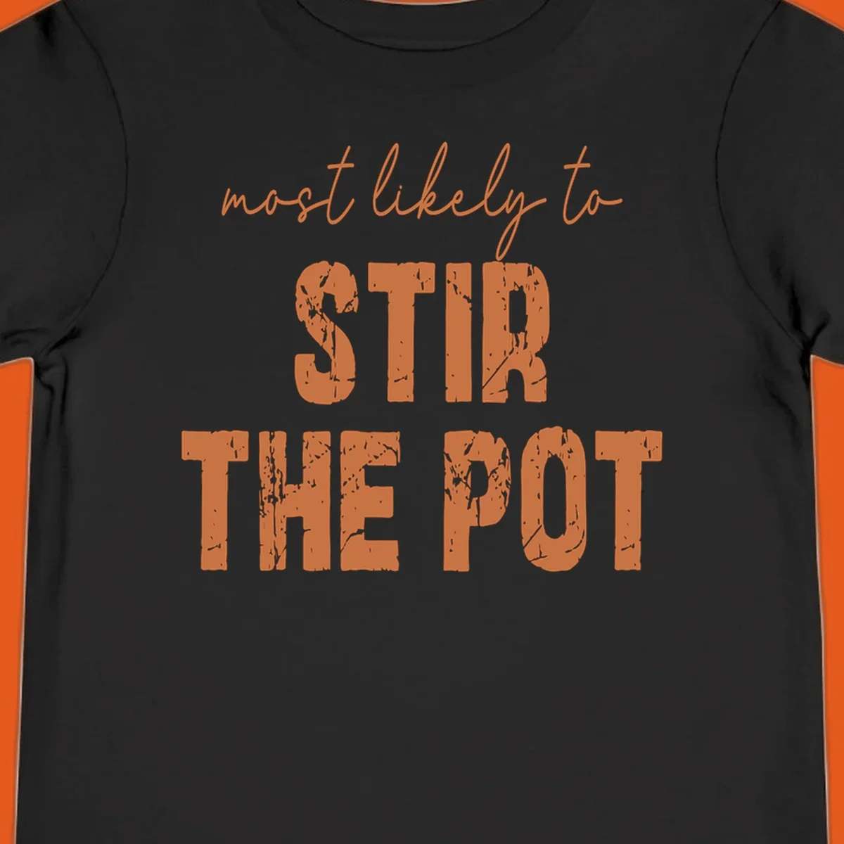 Text design: "most likely to STIR THE POT" in distressed orange letters.