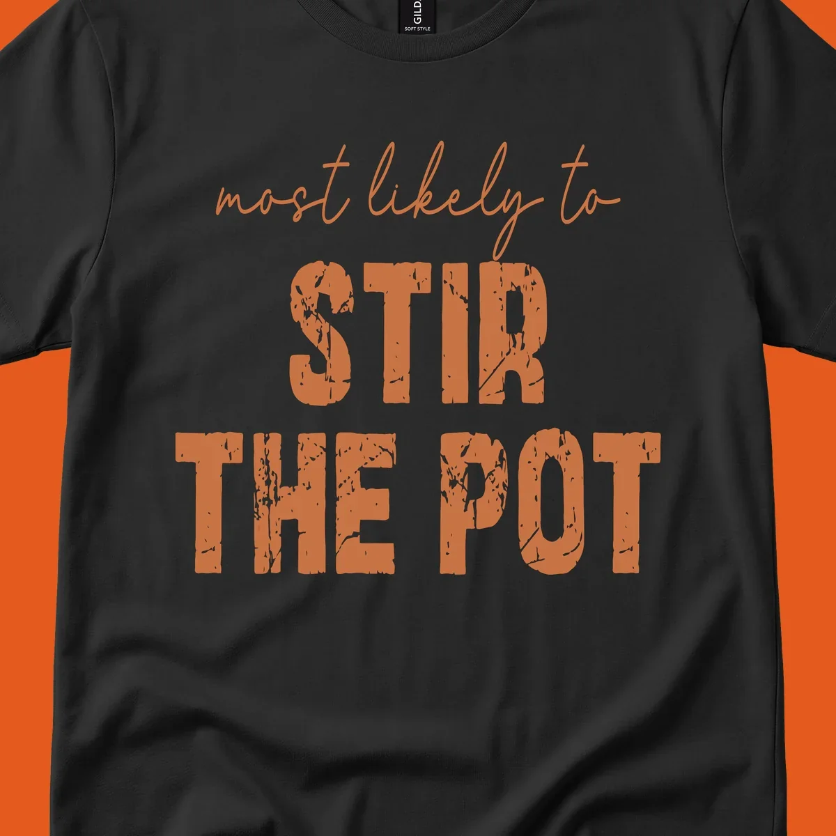 Text design: "most likely to STIR THE POT" in distressed orange letters.