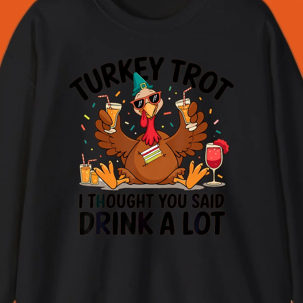 Turkey Trot Drink A Lot Thanksgiving illustration of a partying turkey with drinks and confetti.