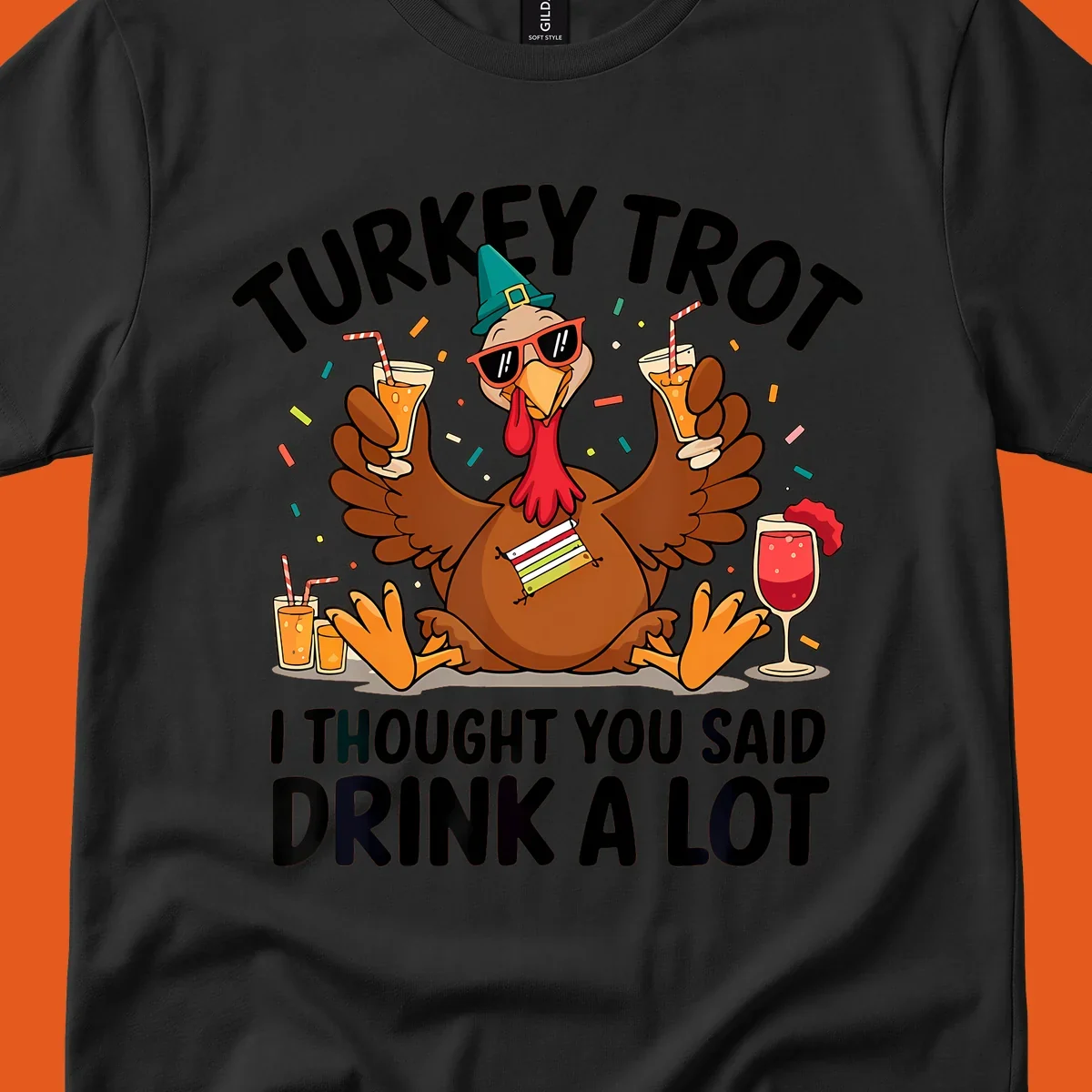 Turkey Trot Drink A Lot Thanksgiving illustration of a partying turkey with drinks and confetti.