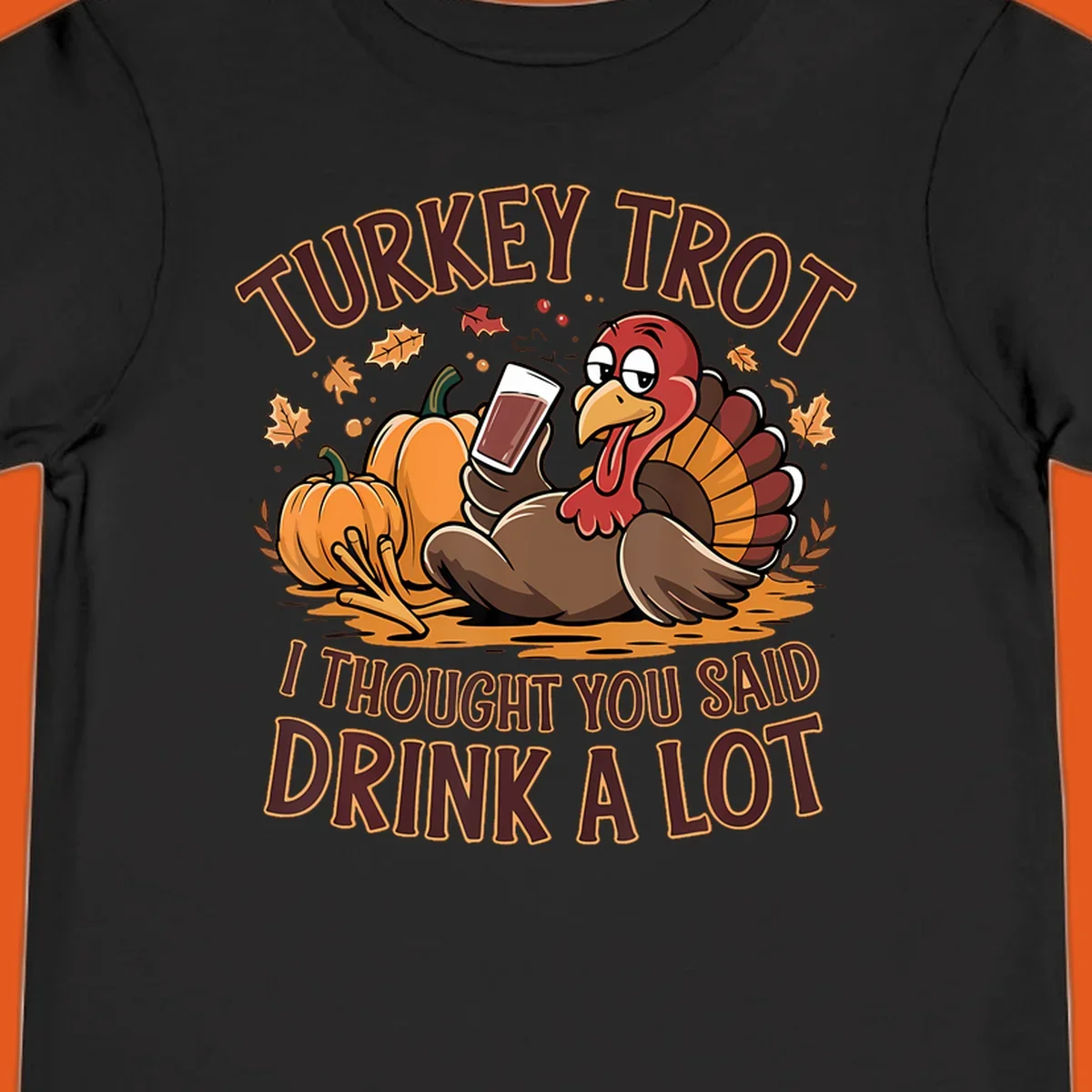 Cartoon turkey with pumpkins and text 'Turkey Trot I Thought You Said Drink A Lot' for Thanksgiving race.