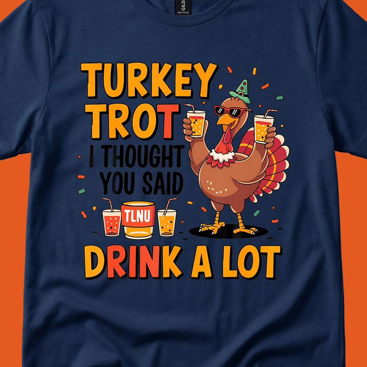 Cartoon turkey with drinks and text 'Turkey Trot I Thought You Said Drink A Lot' for Thanksgiving run.