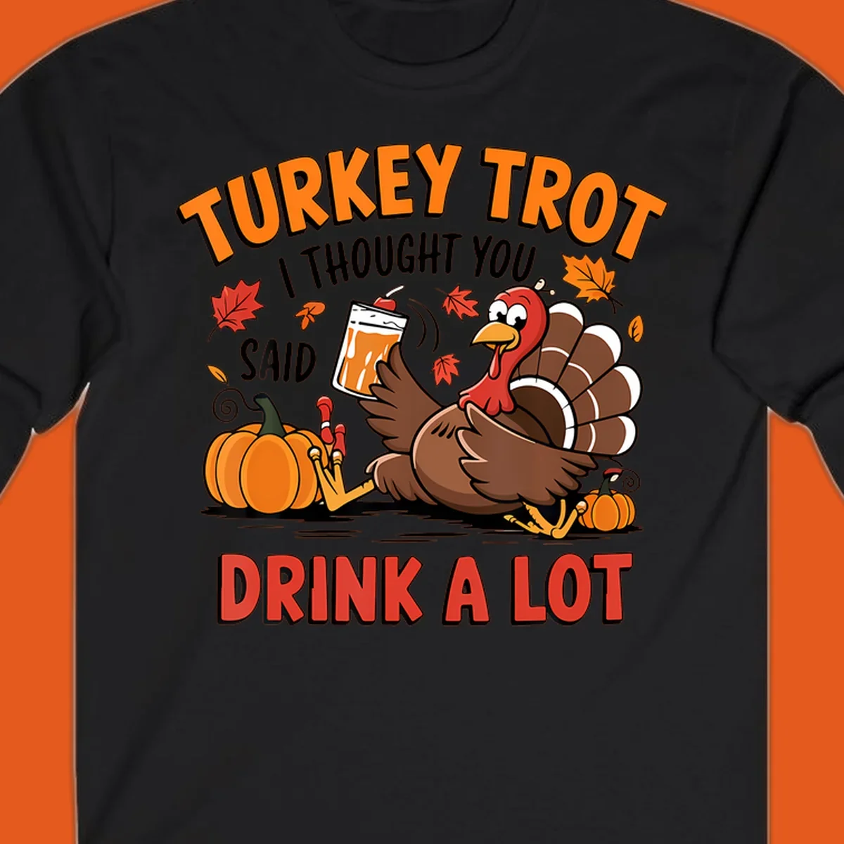 Illustration of a turkey with drink, pumpkins, and leaves, text: Turkey Trot I Thought You Said Drink A Lot.