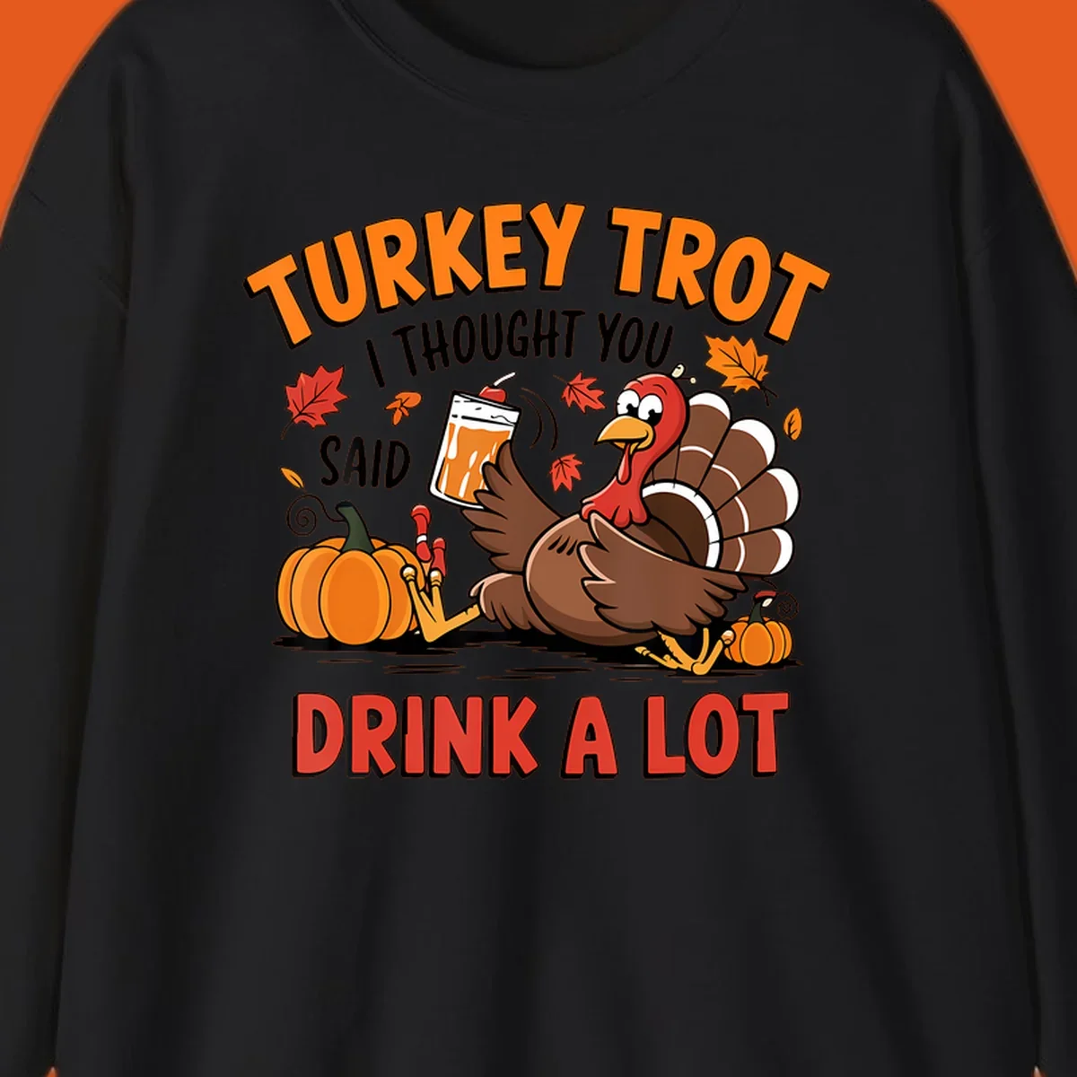 Illustration of a turkey with drink, pumpkins, and leaves, text: Turkey Trot I Thought You Said Drink A Lot.