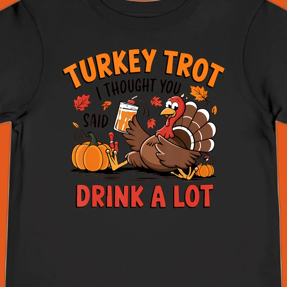 Illustration of a turkey with drink, pumpkins, and leaves, text: Turkey Trot I Thought You Said Drink A Lot.