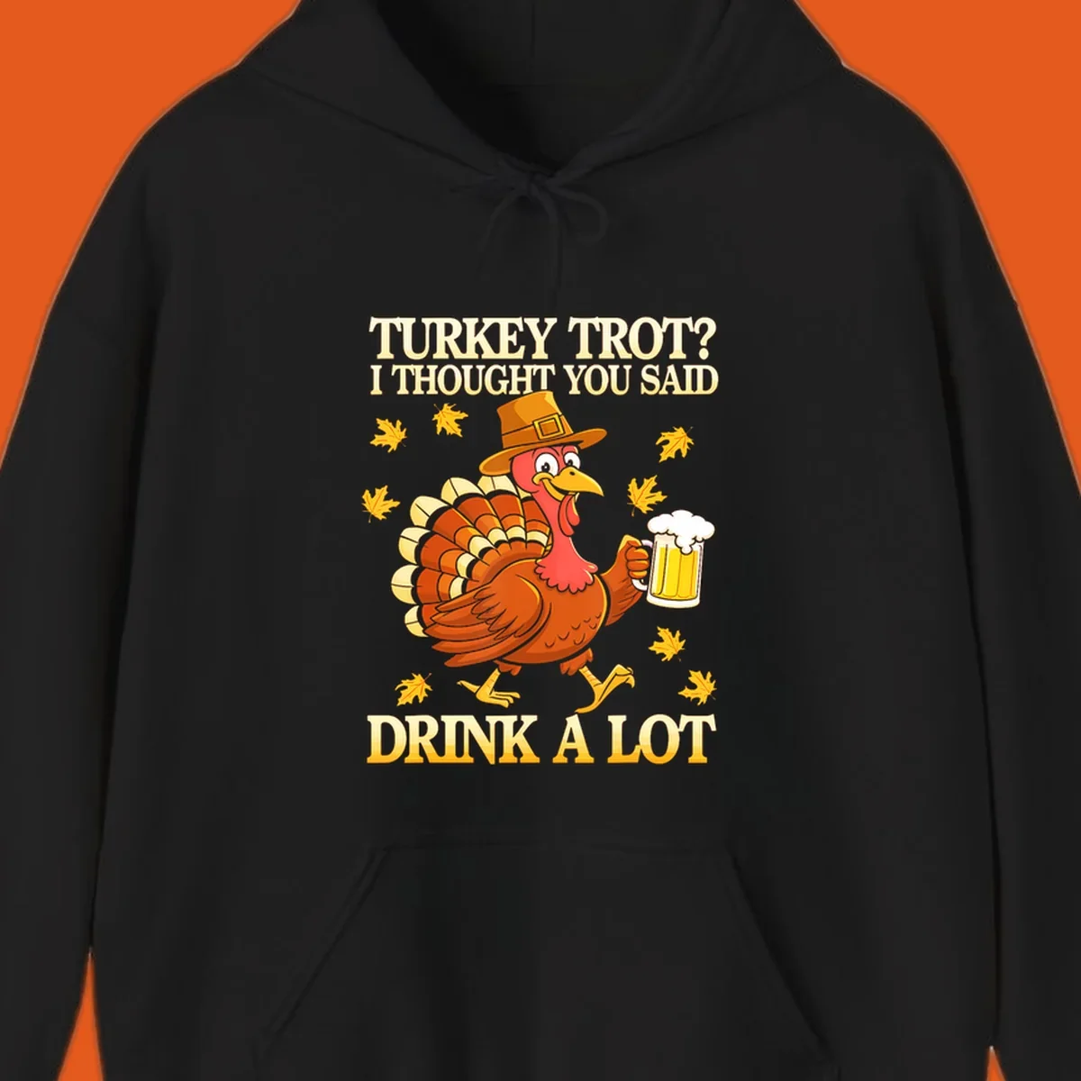 Funny turkey trot drinking pun design with a turkey holding a beer and text 'Turkey Trot? I thought you said Drink a Lot'.