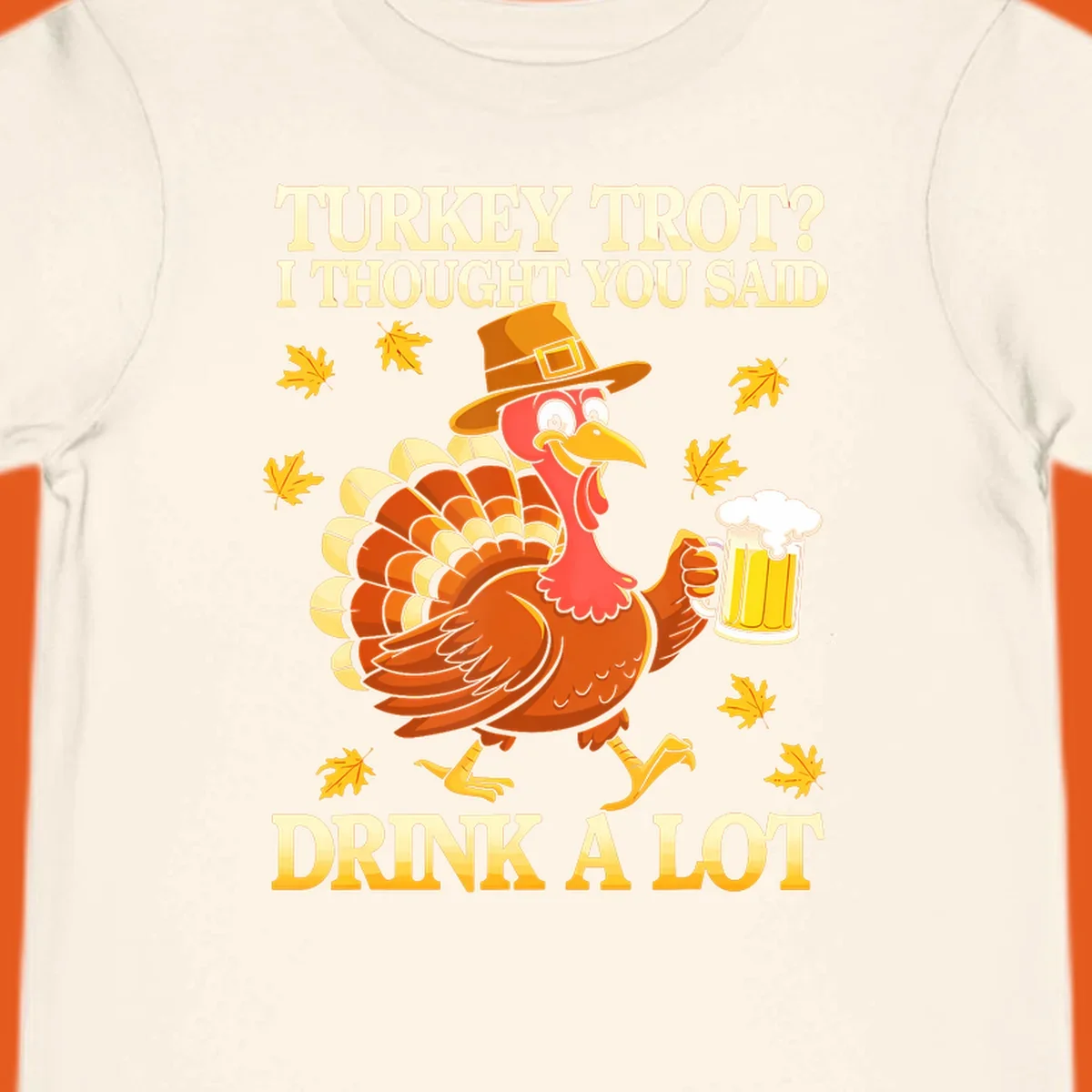Funny turkey trot drinking pun design with a turkey holding a beer and text 'Turkey Trot? I thought you said Drink a Lot'.