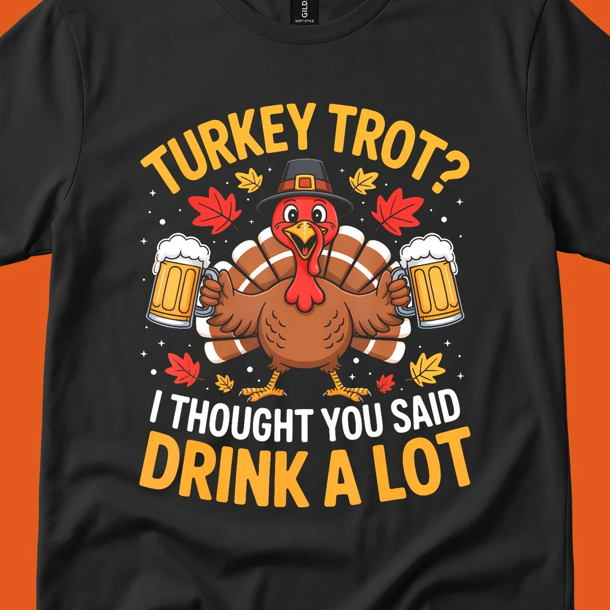 Turkey trot design with a turkey holding beer mugs, text says "Turkey Trot? I Thought You Said Drink A Lot."