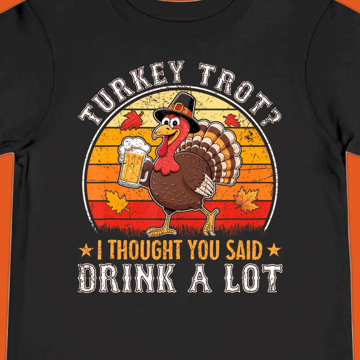 Turkey Trot Drink A Lot Design: Cartoon turkey in pilgrim hat holding beer, with text about drinking.
