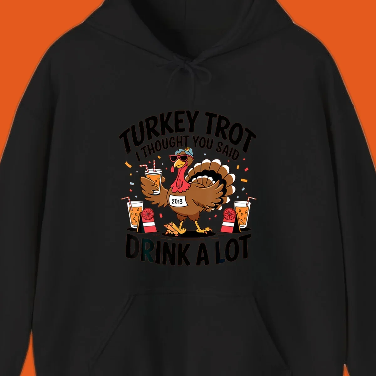 Turkey Trot I Thought You Said Drink A Lot design featuring a cartoon turkey holding a drink.