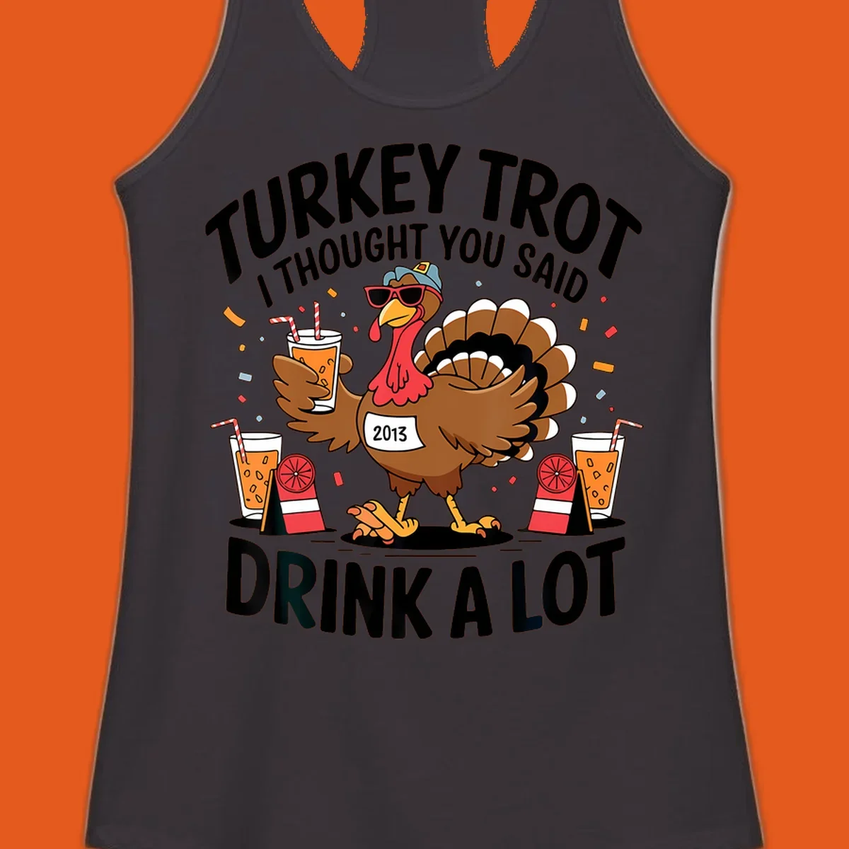 Turkey Trot I Thought You Said Drink A Lot design featuring a cartoon turkey holding a drink.