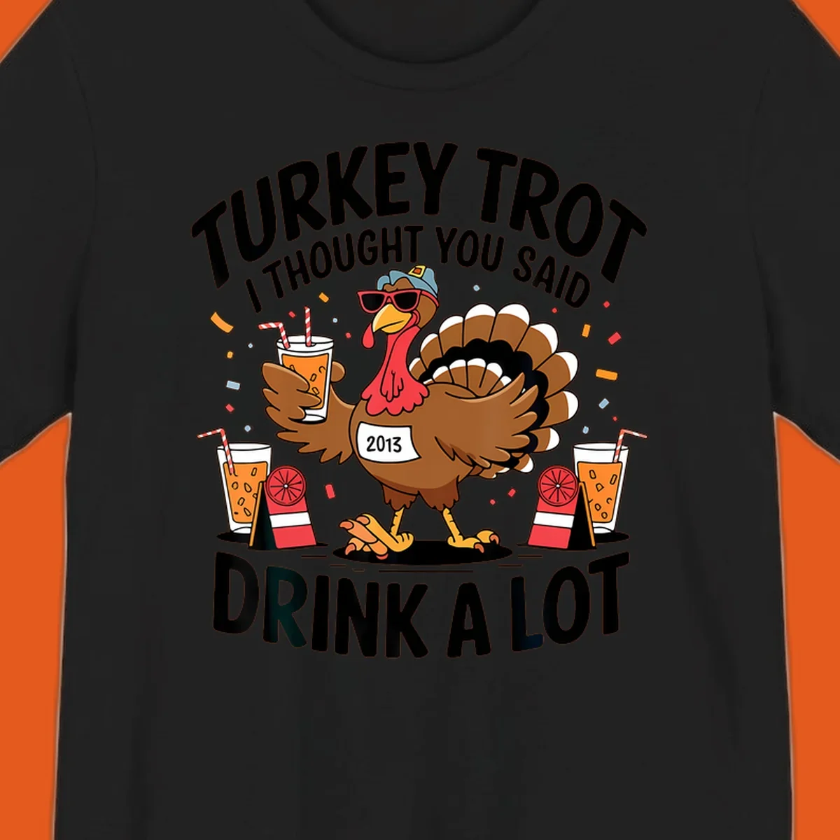 Turkey Trot I Thought You Said Drink A Lot design featuring a cartoon turkey holding a drink.