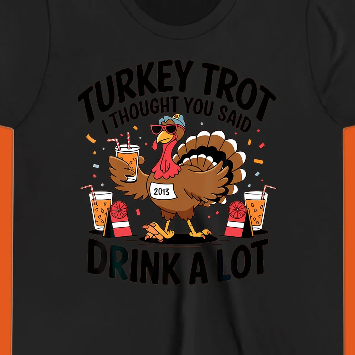 Turkey Trot I Thought You Said Drink A Lot design featuring a cartoon turkey holding a drink.