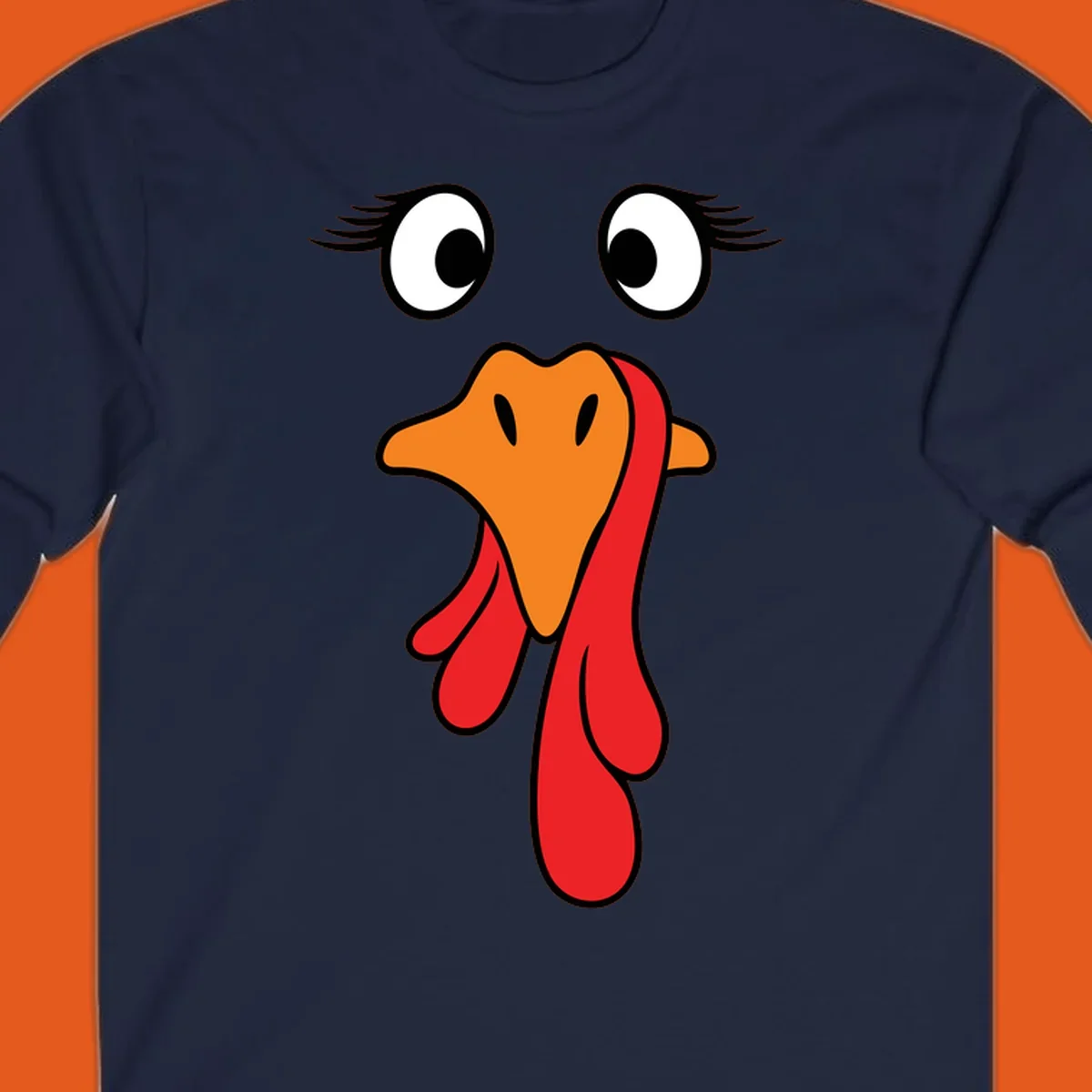 Funny turkey face graphic with googly eyes and wattle, perfect for Thanksgiving Trot runners.