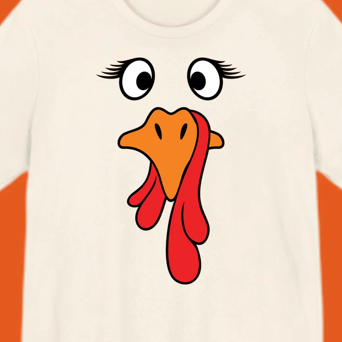 Funny turkey face graphic with googly eyes and wattle, perfect for Thanksgiving Trot runners.