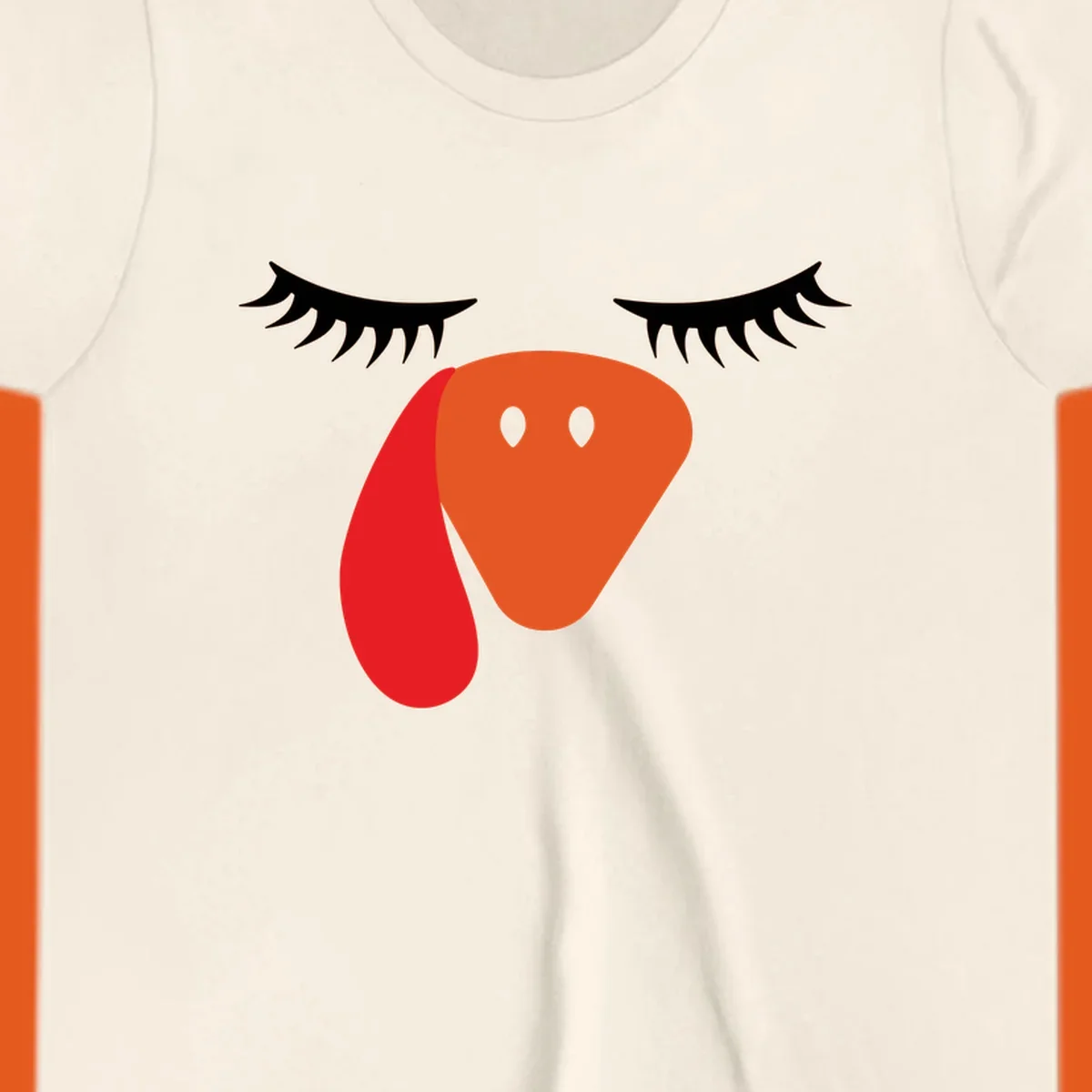 Funny turkey face graphic with closed eyes and eyelashes, perfect for Turkey Trot shirts.