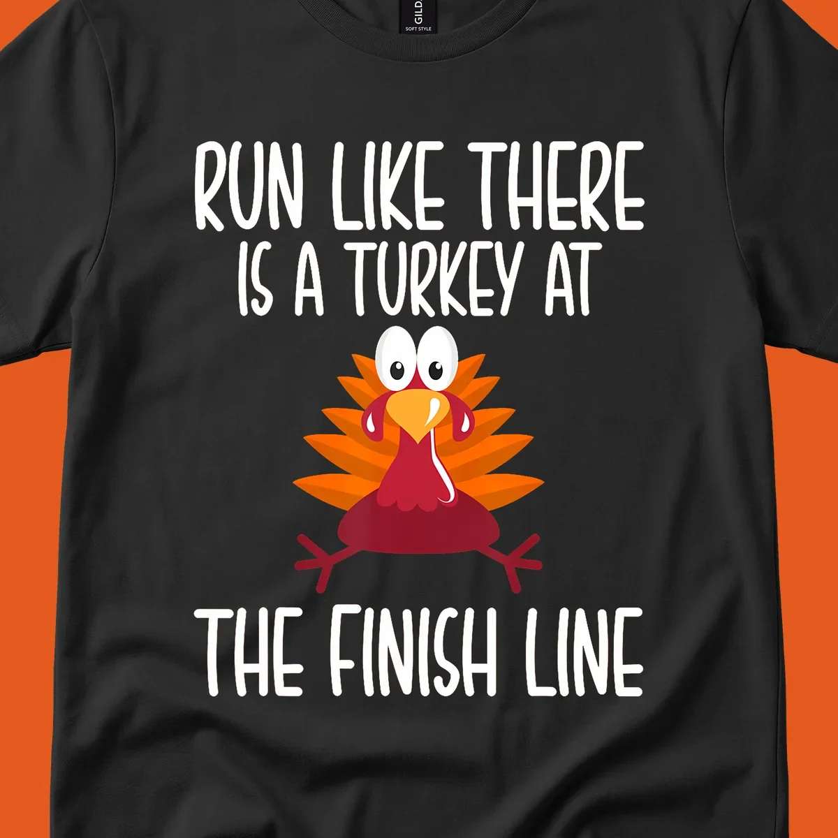 Cartoon turkey running with text 'Run Like There Is A Turkey At The Finish Line', turkey trot runner.