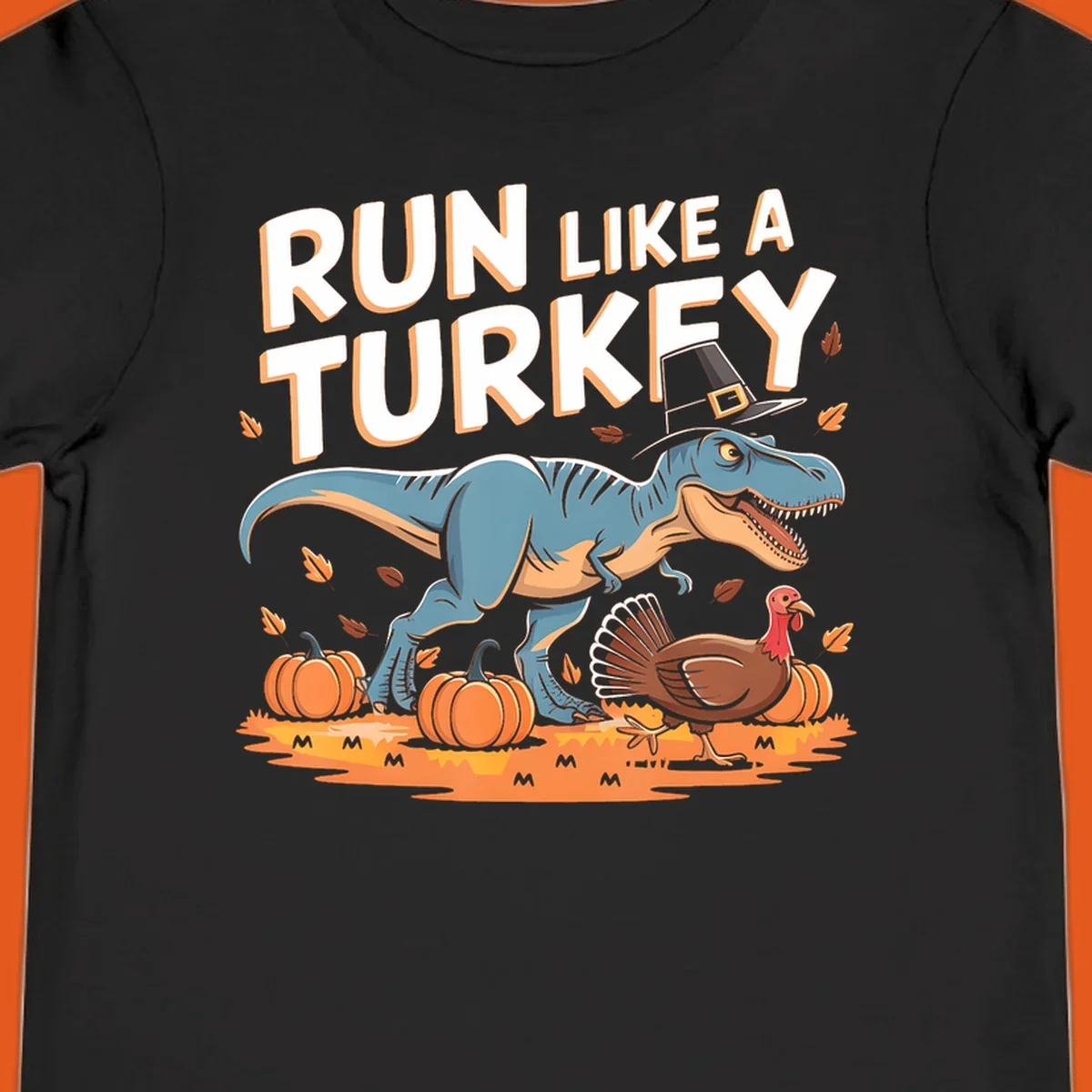 Run like a turkey dinosaur design with T-Rex, turkey, pumpkins and text.