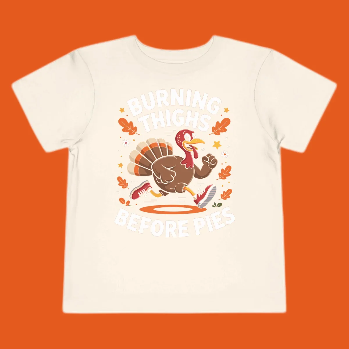 Illustration of a running turkey with text 'Burning Thighs Before Pies', for a Turkey Trot shirt.