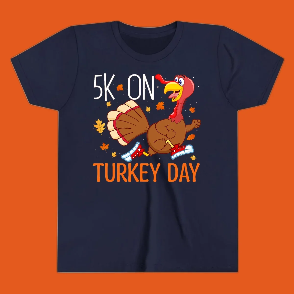 Running turkey illustration with "5K ON TURKEY DAY" text for Turkey Trot shirts.