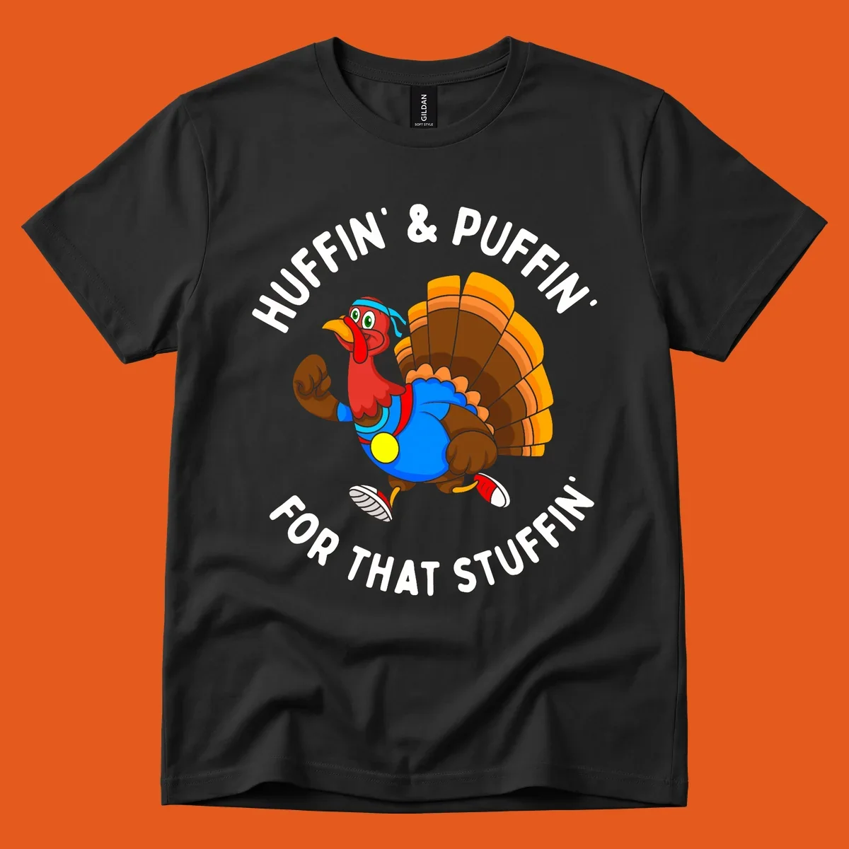 Running turkey cartoon with text 'Huffin' & Puffin' For That Stuffin'' for Turkey Trot runner.