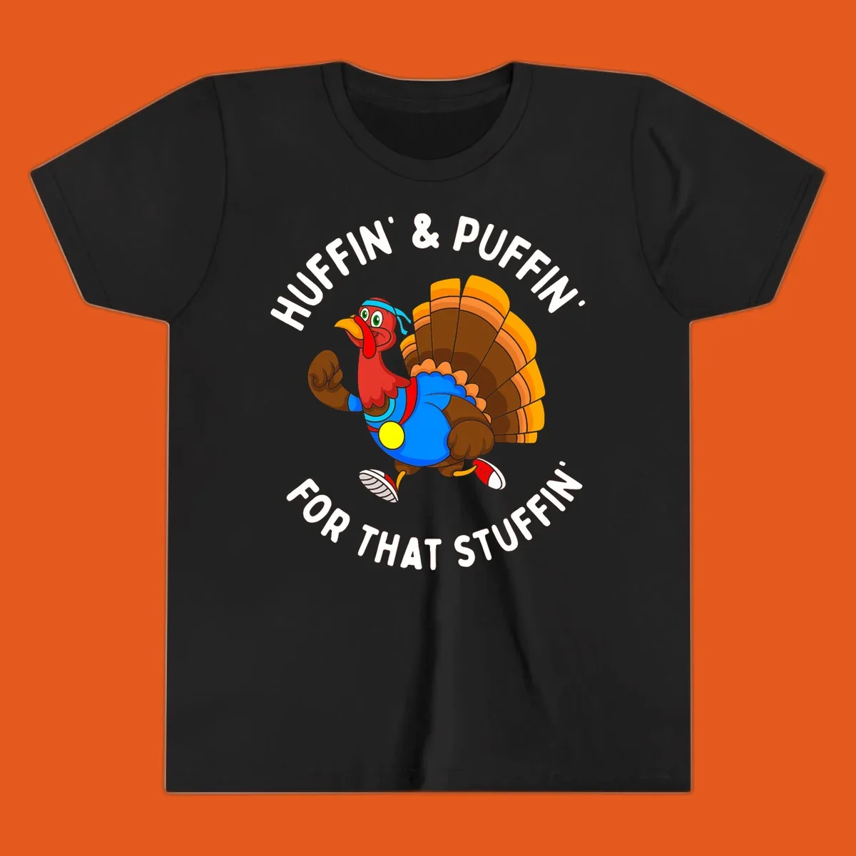 Running turkey cartoon with text 'Huffin' & Puffin' For That Stuffin'' for Turkey Trot runner.