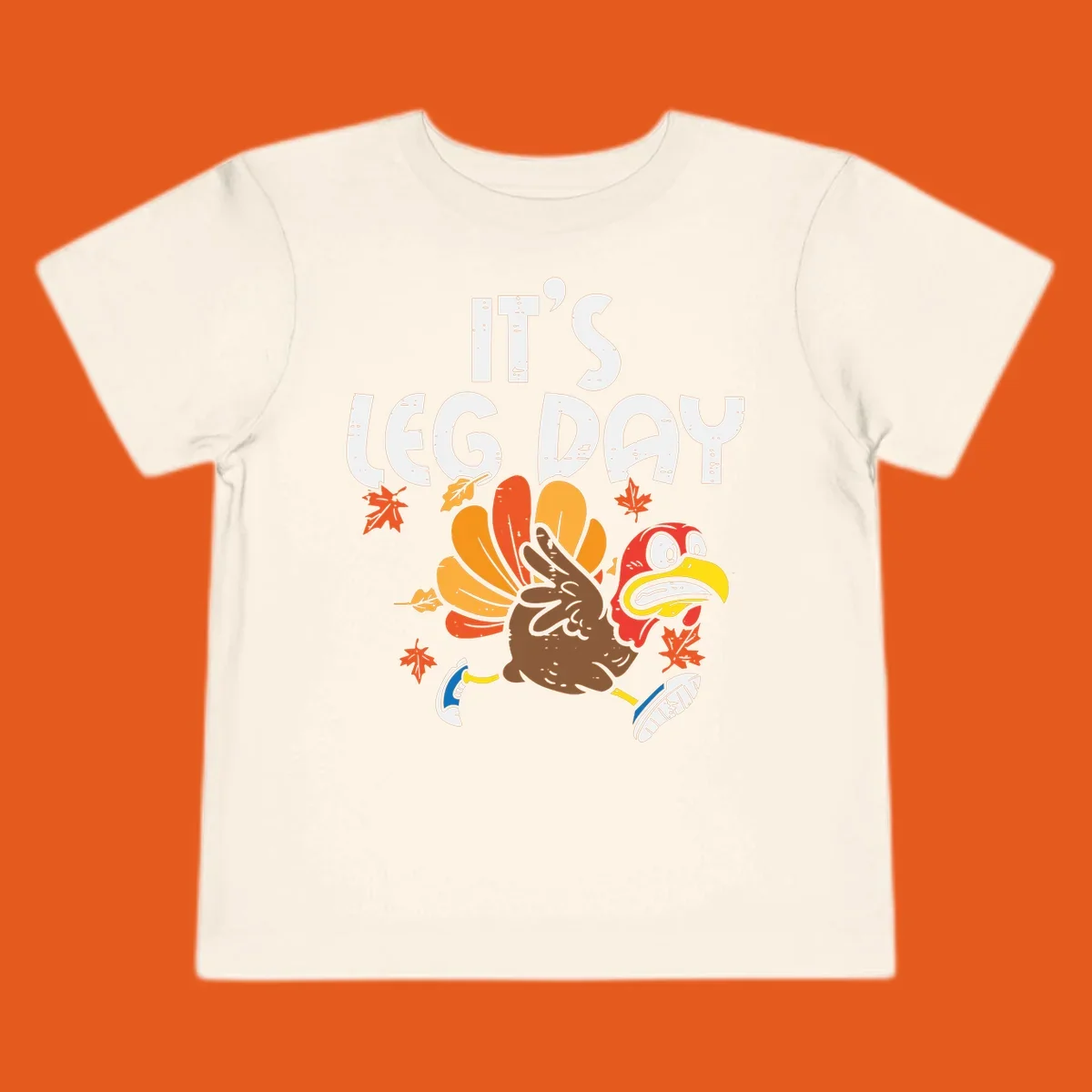 Running turkey with text 'IT'S LEG DAY' for Thanksgiving Turkey Trot shirt.