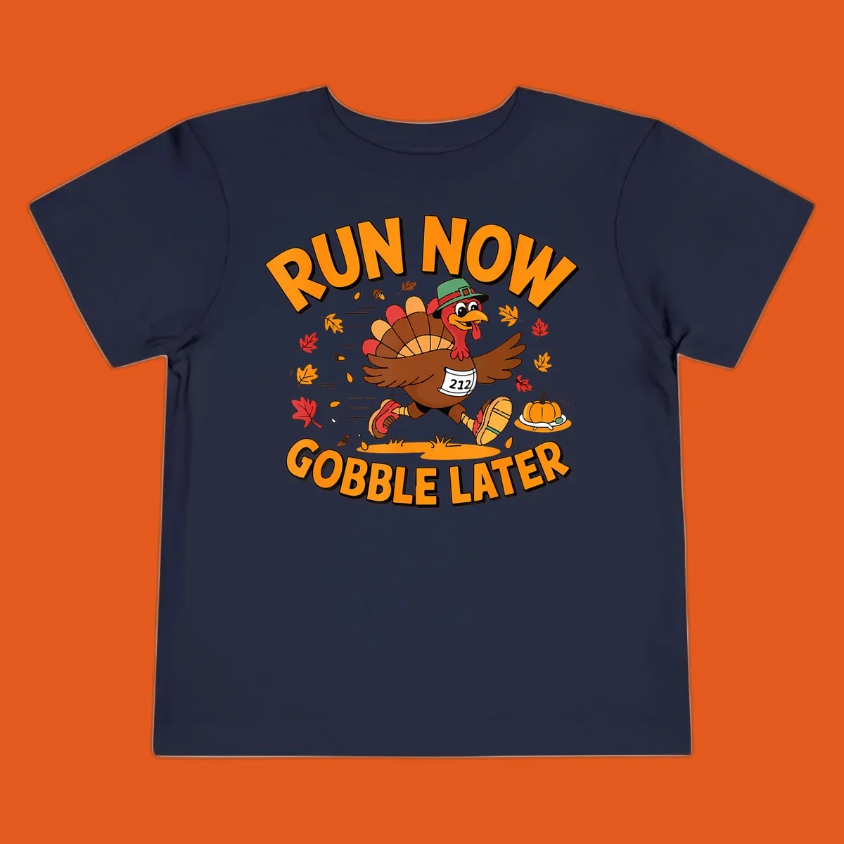 Running turkey with 'Run Now Gobble Later' text for Turkey Trot race.