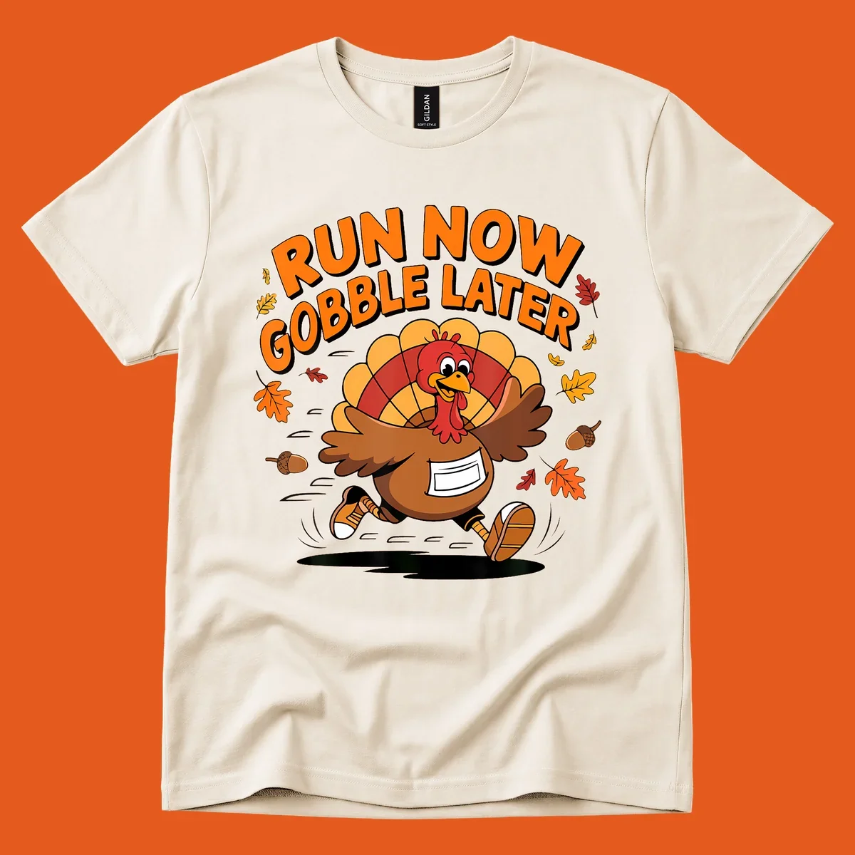 Cartoon turkey running with text "RUN NOW GOBBLE LATER" for Thanksgiving Turkey Trot shirt.