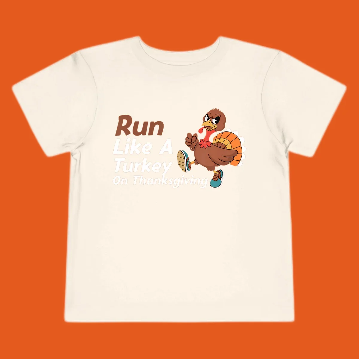 Run Like A Turkey Thanksgiving design with a cartoon turkey running and text, for turkey trot runners.