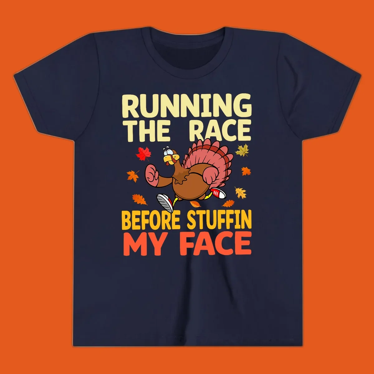 Running turkey with text "RUNNING THE RACE BEFORE STUFFIN MY FACE", a Thanksgiving run concept.
