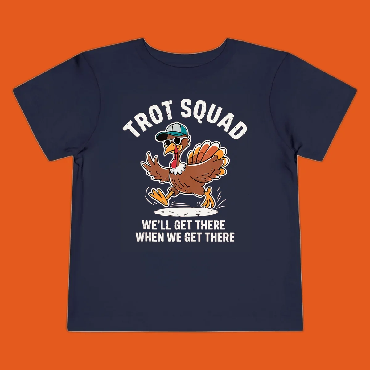 Illustration of a running turkey with sunglasses and hat, text 'TROT SQUAD WE'LL GET THERE WHEN WE GET THERE'.
