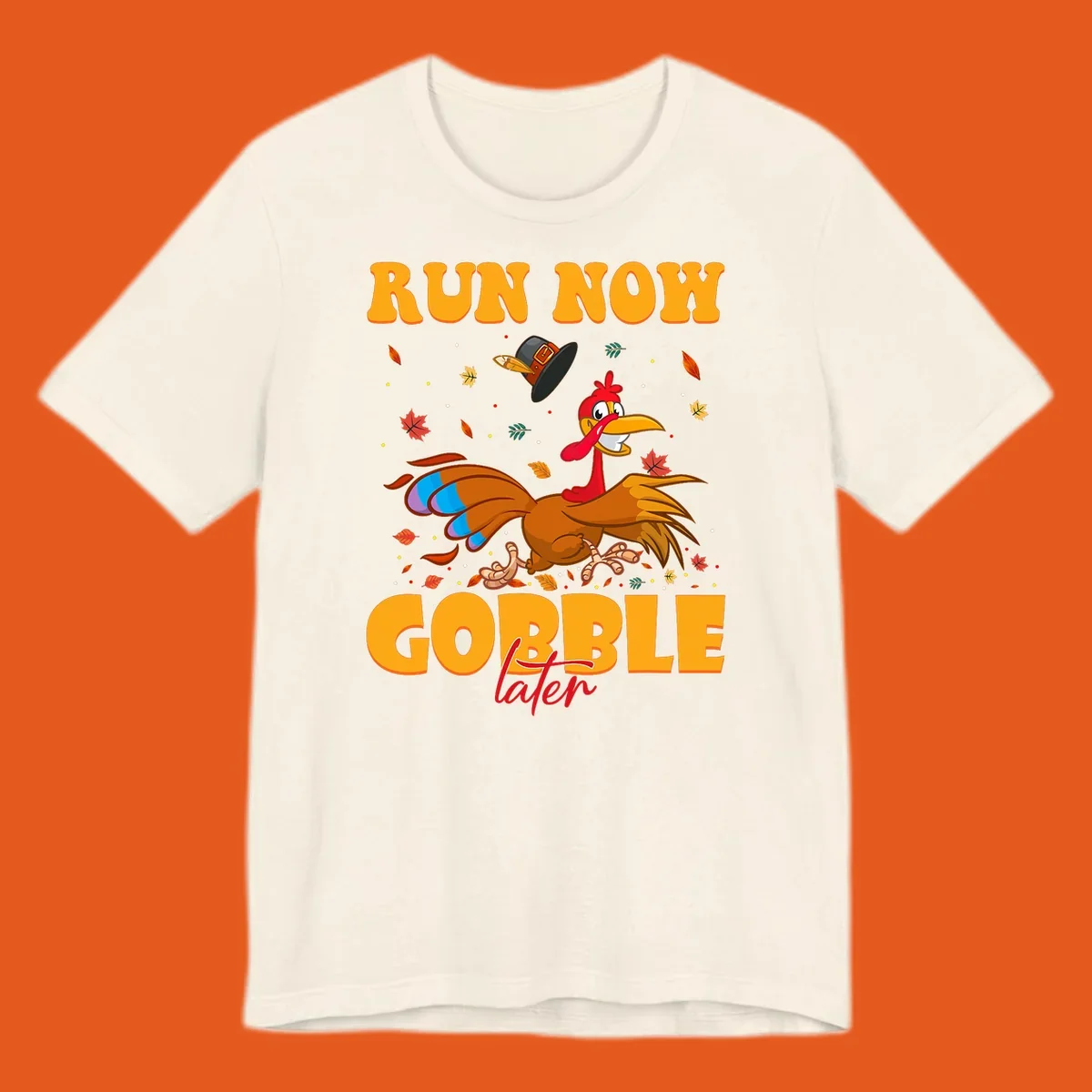 Cartoon turkey running with pilgrim hat, text "RUN NOW GOBBLE later" for Turkey Trot shirt.