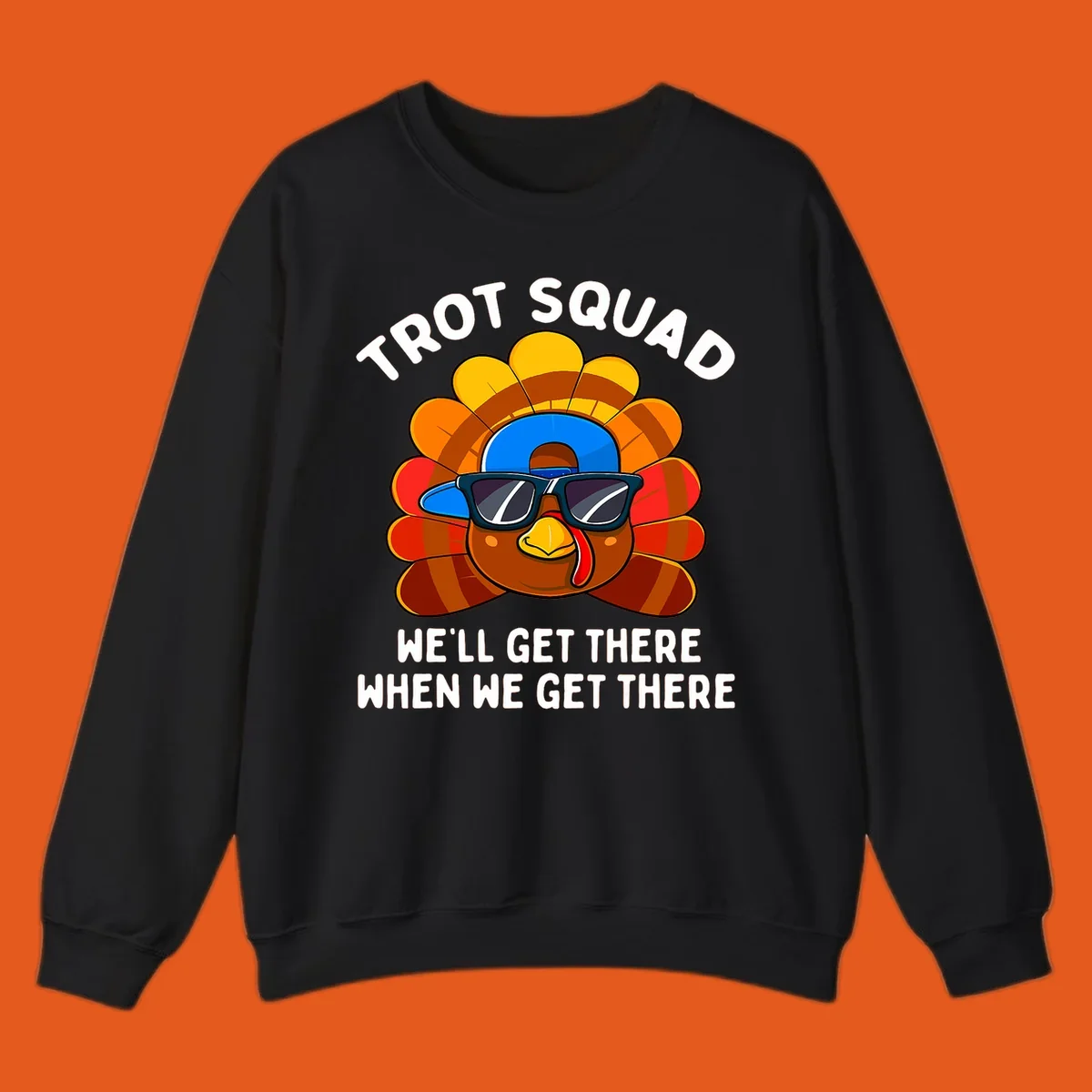Turkey Trot Squad cool turkey with sunglasses and cap, text 'WE'LL GET THERE WHEN WE GET THERE' shirt