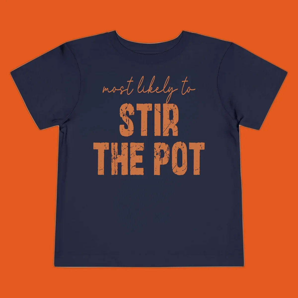 Text design: 'most likely to STIR THE POT' in distressed orange font on a black background.