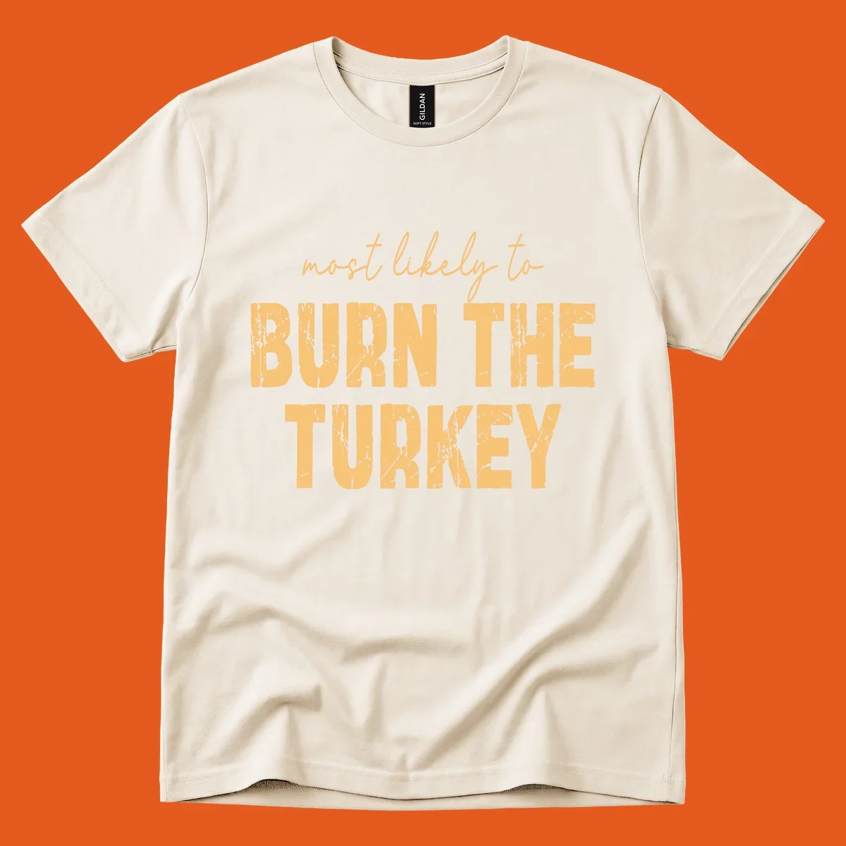 Text design "most likely to BURN THE TURKEY" with distressed lettering.