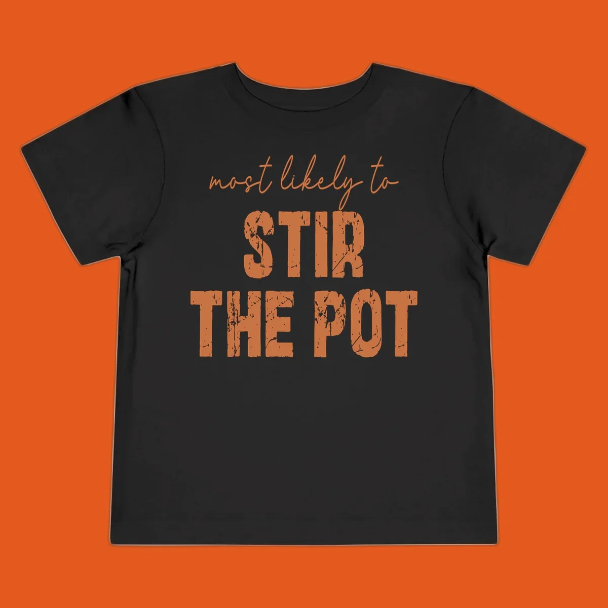 Text design: "most likely to STIR THE POT" in distressed orange letters.