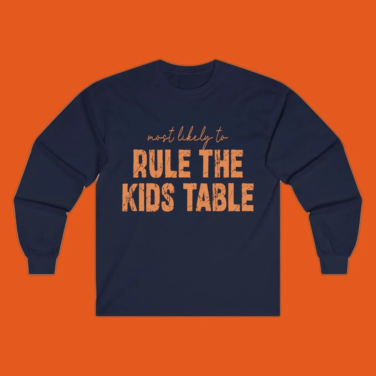 Text design 'Most Likely to Rule the Kids Table' in distressed orange font.