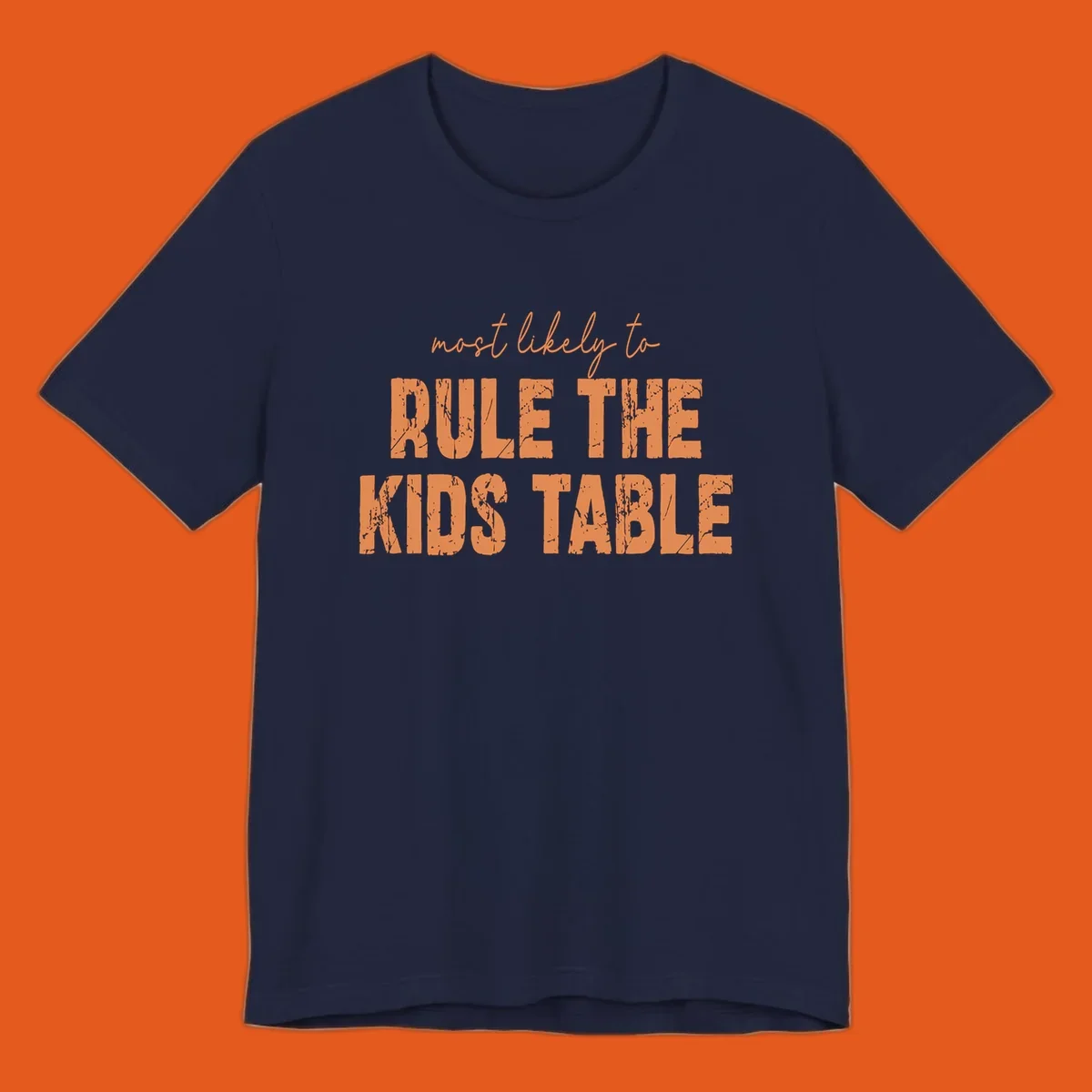 Text design 'Most Likely to Rule the Kids Table' in distressed orange font.