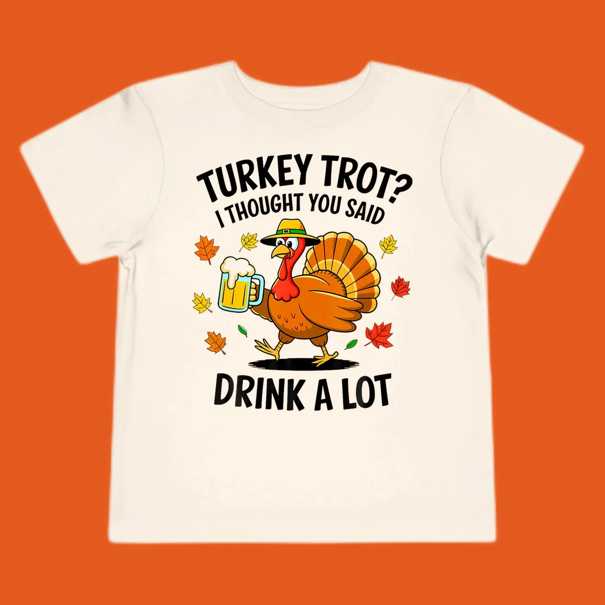 Cartoon turkey holding beer mug with text 'Turkey Trot? I thought you said Drink a Lot.'