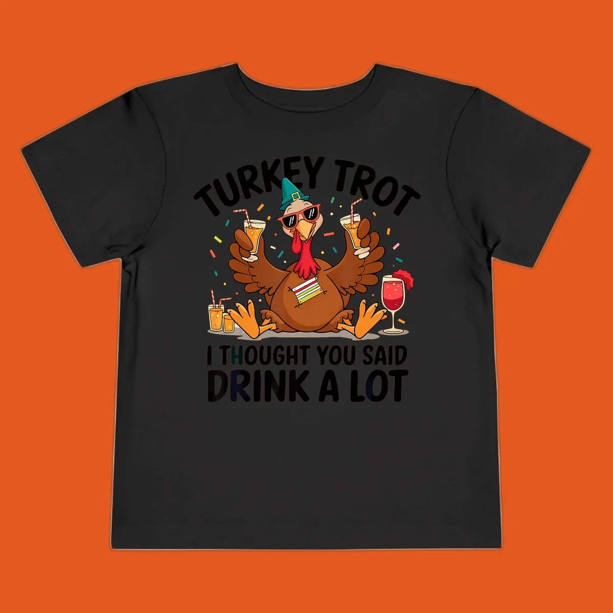 Turkey Trot Drink A Lot Thanksgiving illustration of a partying turkey with drinks and confetti.