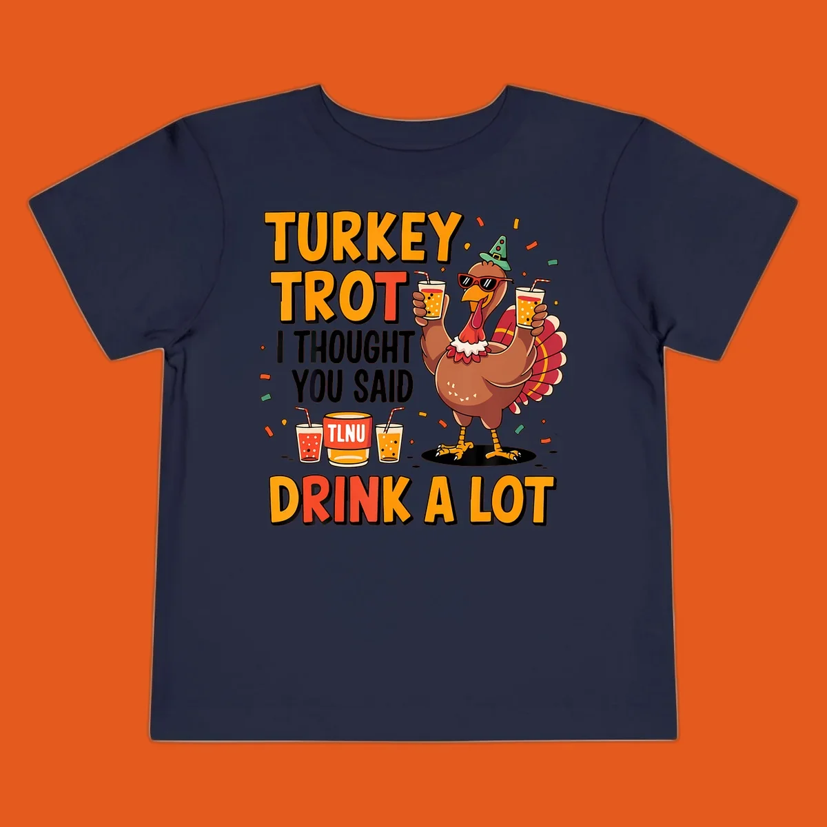 Cartoon turkey with drinks and text 'Turkey Trot I Thought You Said Drink A Lot' for Thanksgiving run.