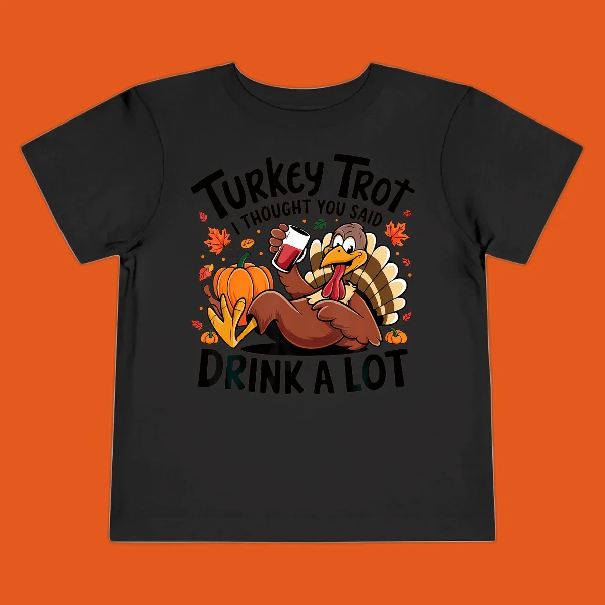 Funny cartoon turkey holding a drink with 'Turkey Trot I thought you said drink a lot' text for Thanksgiving run shirt.