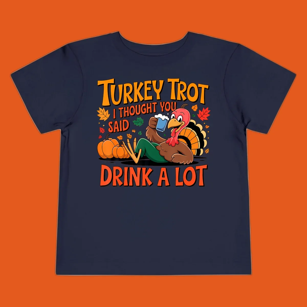 Illustration of a cartoon turkey drinking beer with text 'Turkey Trot I Thought You Said Drink A Lot'.