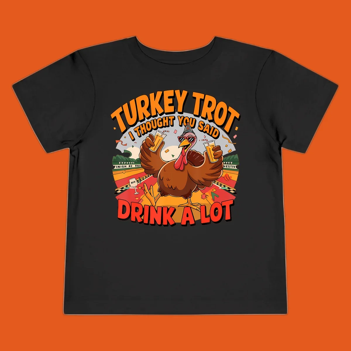 Illustration of a turkey on a race track holding drinks, with text 'Turkey Trot I Thought You Said Drink A Lot'.