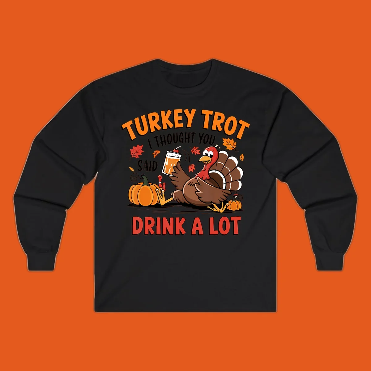 Illustration of a turkey with drink, pumpkins, and leaves, text: Turkey Trot I Thought You Said Drink A Lot.
