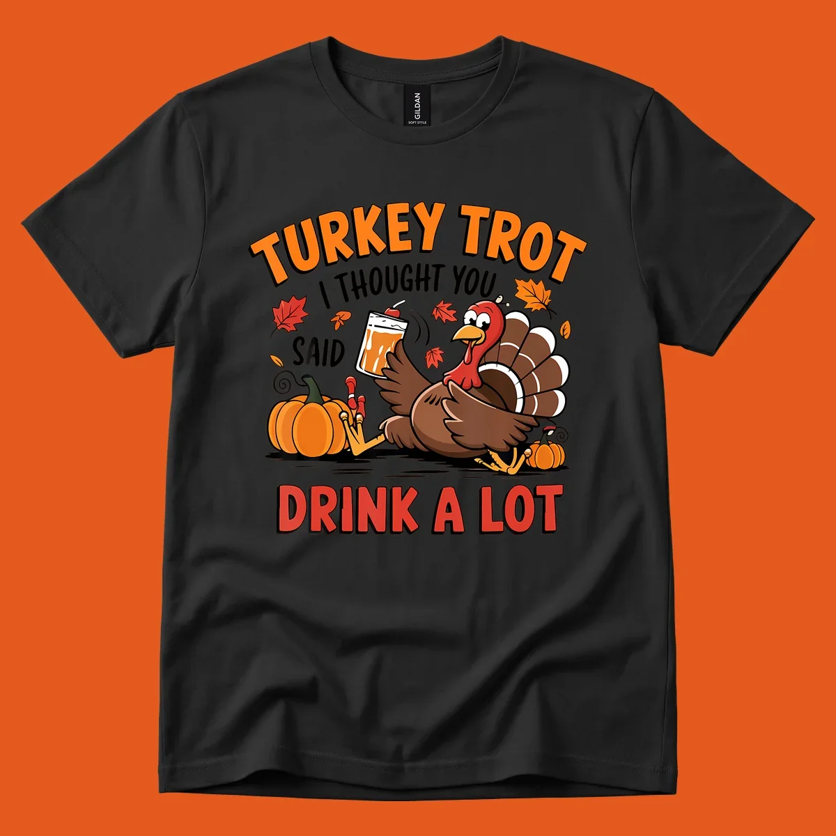 Illustration of a turkey with drink, pumpkins, and leaves, text: Turkey Trot I Thought You Said Drink A Lot.
