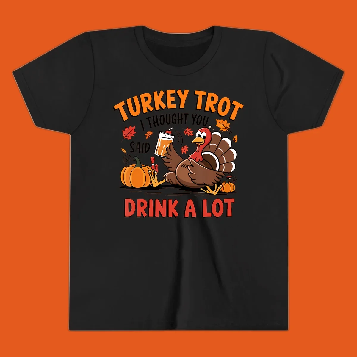 Illustration of a turkey with drink, pumpkins, and leaves, text: Turkey Trot I Thought You Said Drink A Lot.
